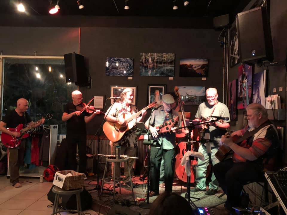 Image of Stage with several musicians sitting in with the band Hot Sauce Moon